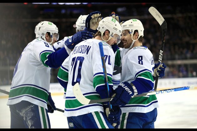 Canucks open road trip with triumph over Rangers