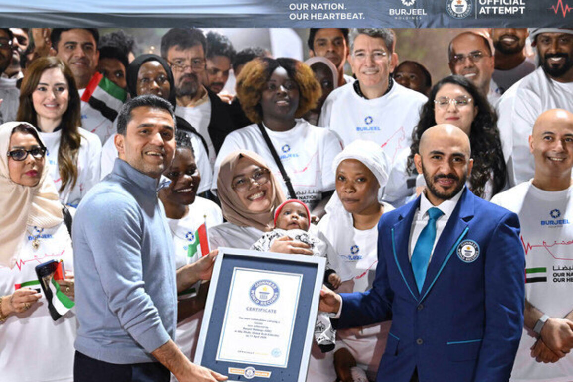 UAE sets Guinness World Record for most nationalities carrying flag banner