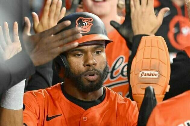 Orioles rack up 15 hits, win home opener over Red Sox