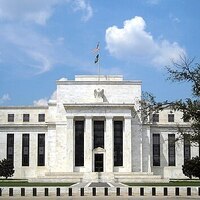 Fed may hike rates if inflation stays high, official says