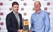  Anglo American underground principal for technology and automation Shane McDowall accepting the Innovation Award at the recent Mine Electrical Safety Conference in Brisbane with Ampcontrol’s Tim Wylie.