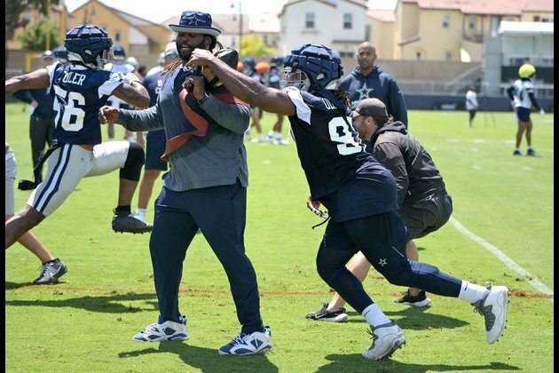Cowboys assistant Sharrif Floyd released from hospital