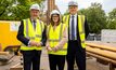 Economy Minister Conor Murphy, Finance Minister Dr Caoimhe Archibald and the US Special Envoy to Northern Ireland for Economic Affairs, Joe Kennedy III at the geothermal test drill site in Stormont. Credit: GeoEnergy NI