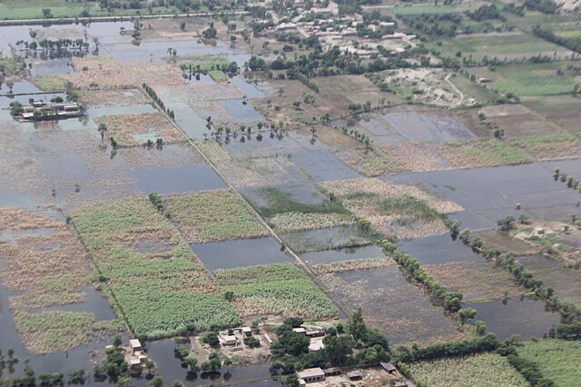 Emergency workers saving stranded families in flooded Pakistan