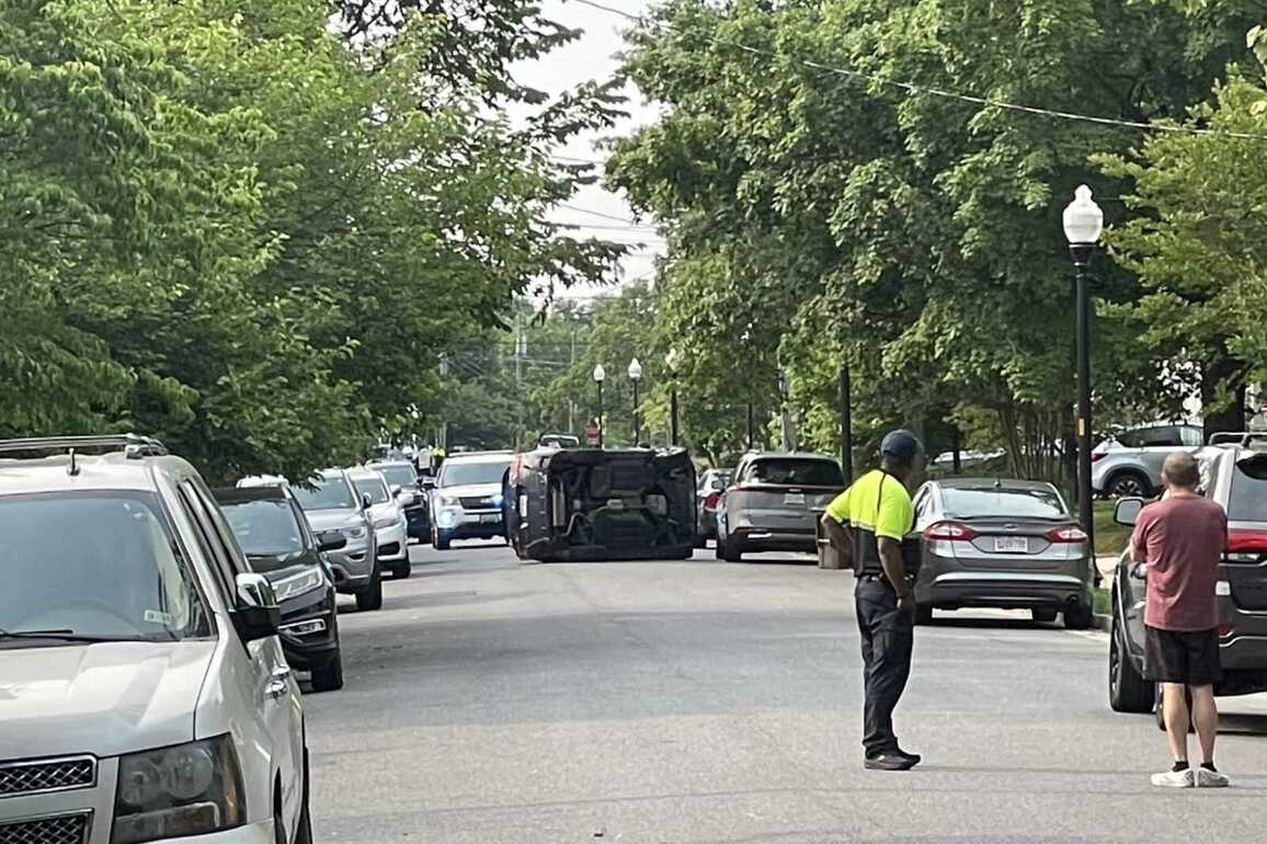 Overturned vehicle closes road in Arlington Heights