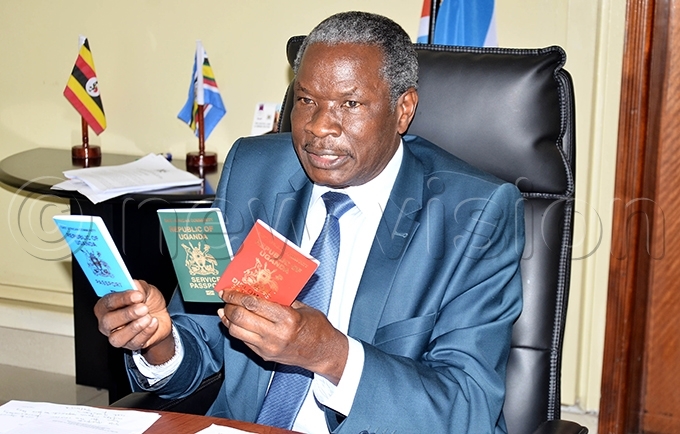 inister ario biga ania displays the new types of gandan passports hoto by onnie ijjambu
