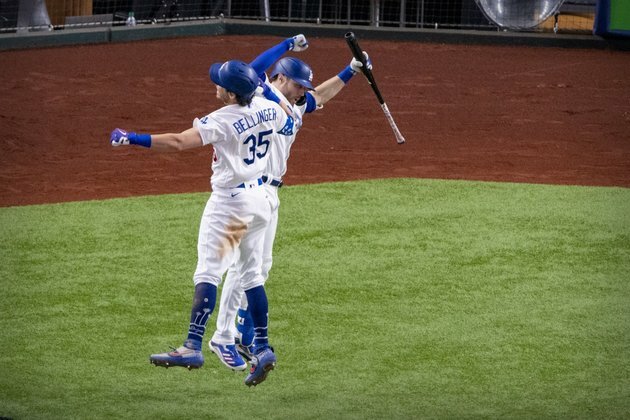 Dodgers' Bellinger says he's fine after arm slam injures shoulder
