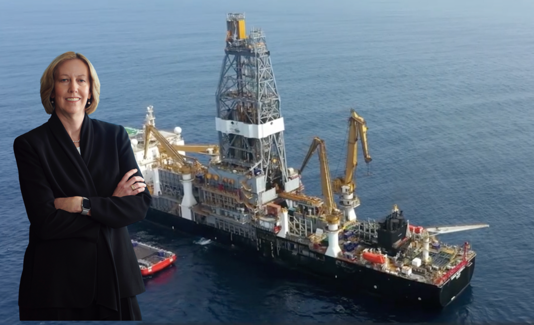 Woodside CEO Meg O’Neill pictured in front. Behind, a drillship supporting Senegal’s historic Sangomar oil project, the nation’s first offshore development to reach production.
