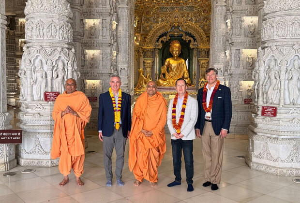 French President wishes 'friend' PM Modi, US Envoy visits BAPS on Holi