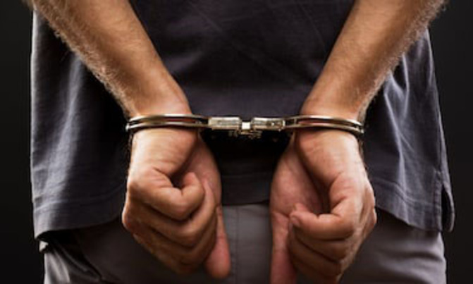 Two men held over illegal possession of army uniform Two men held over illegal possession of army uniform