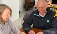 NEAC director Stephen Craig and Living Lab participant Sue discuss her electricity use, as tracked by a device NEAC provided and installed to help Sue and CSIRO researchers gain insights into household energy use.