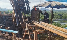 Field geologist on the drilling rig at the Reung Kiet lithium project in Thailand 