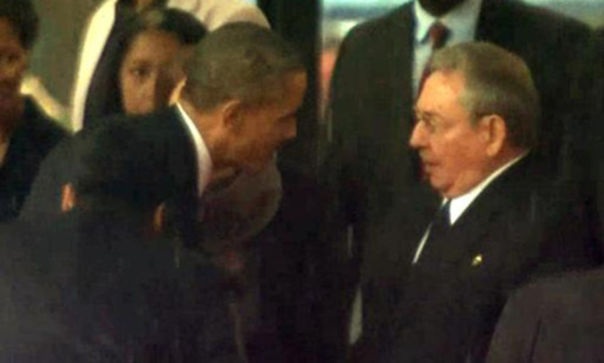 Obama shakes hands with Cuba's Castro at Mandela memorial Obama shakes hands with Cuba's Castro at Mandela memorial