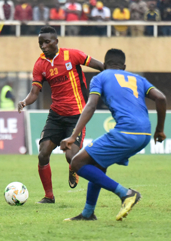 ranes midfielder oses aiswa dribbles against anzania in a recent ations up qualifier icture y palanyi sentongo