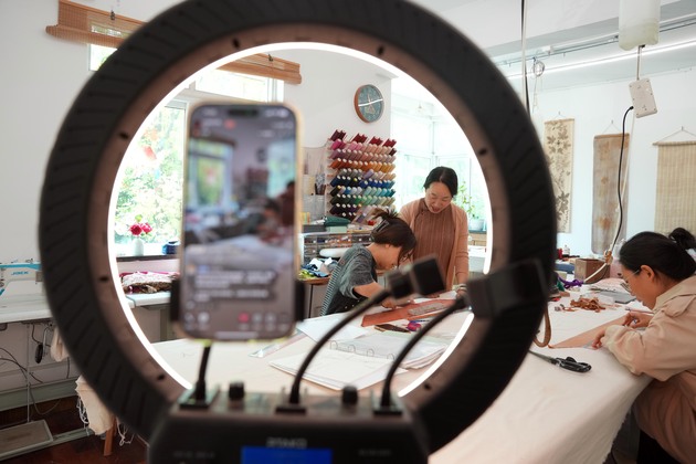 ChineseToday | Escaping urban hustle with stitches: Qipao studio owner's life in suburban Shanghai