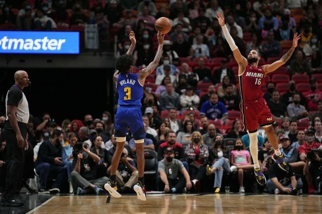 Nikola Jokic leads Nuggets past short-handed Heat
