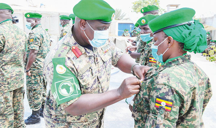 A Battle Group 27 officer receiving a medal