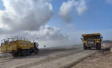 A mining truck and excavator in Tantalum, Indonesia