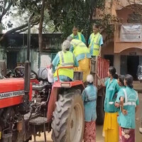Sanitation workers' dignity: Women transported in a garbage truck to medical camp in TN
