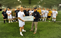 Russell's team raises £8,000 