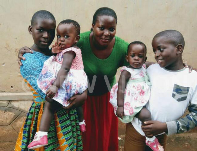  alwoga with the twins and her other children