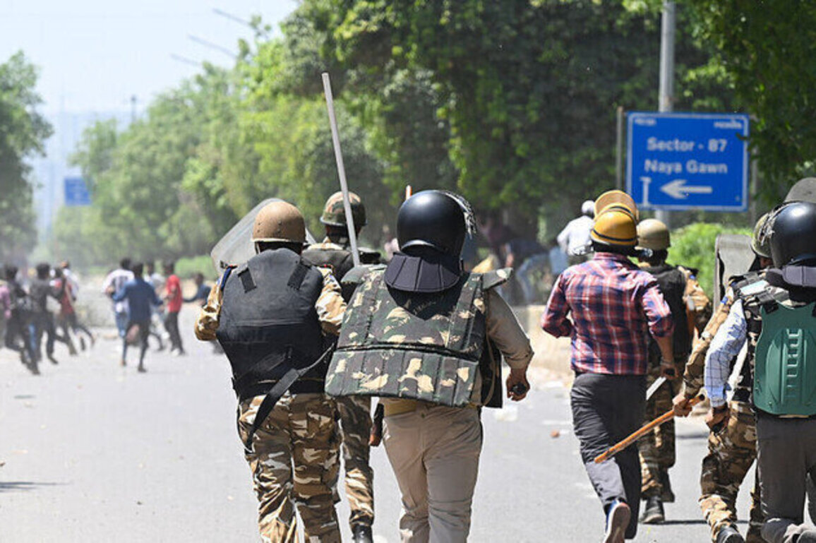 Wage hike protests turn violent in India