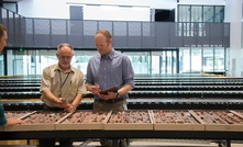 Geologists with the Geological Survey of SA, Wayne Cowley and Dr Rian Dutch, inspect drill core from Carrapateena