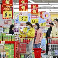 Experts hail China's efforts on global economic stability, multilateralism