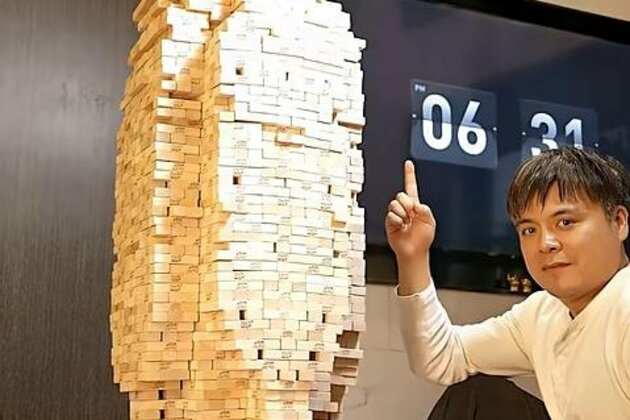 Watch- Stacking skills with cards and Jenga blocks earn man 4 world records