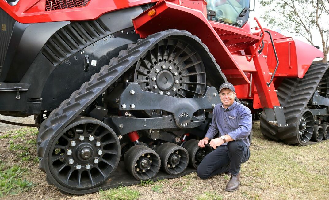 Justin Bryant, CNH high horsepower product manager for ANZ, with a Steiger Quadtrac 645 at the FarmFest field days in Queensland recently.