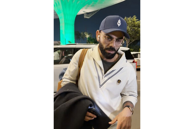Virat Kohli makes cool appearance at Mumbai airport hours after scoring century against NZ