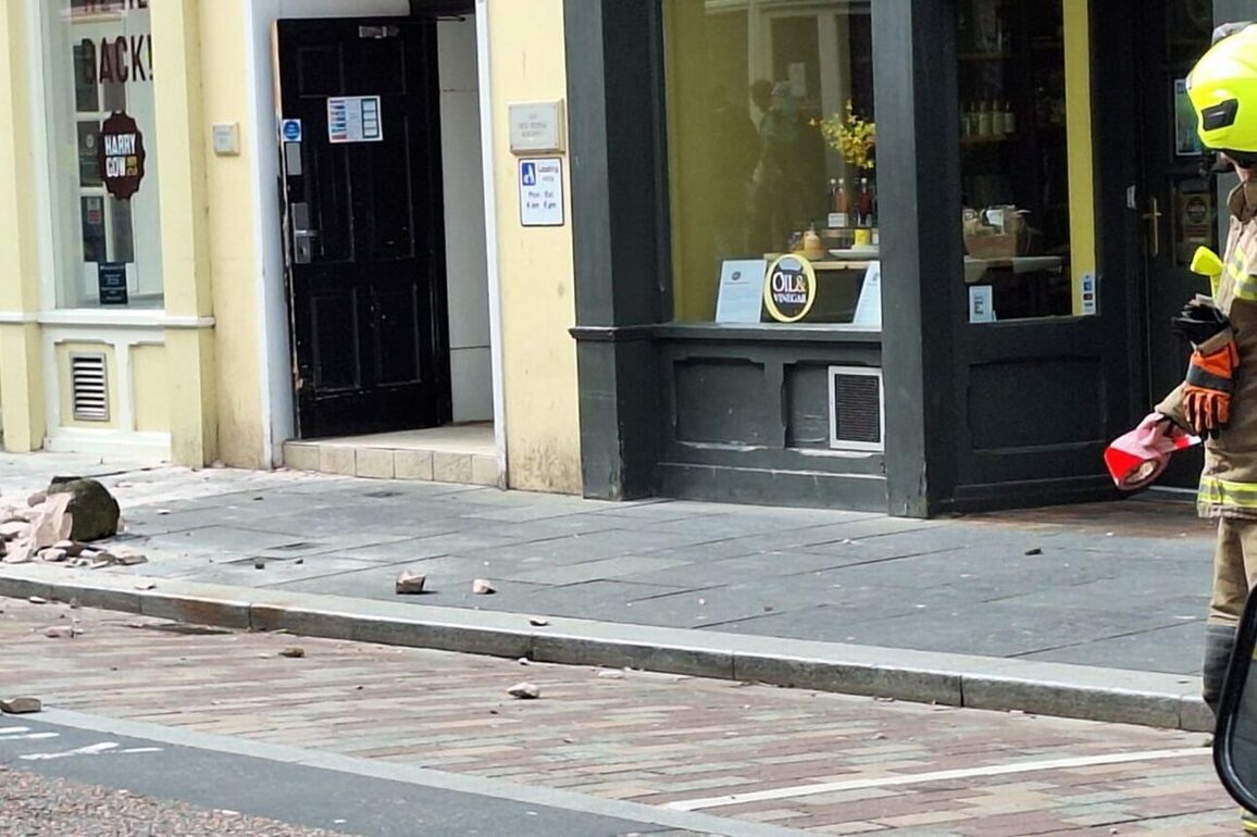 Fallen masonry forces closure of busy Inverness street