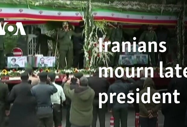 Iranians mourn late president