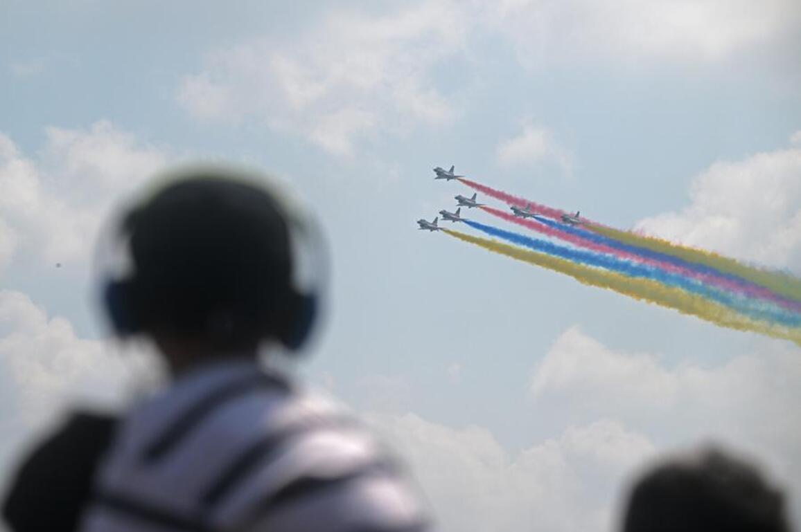 Asia Album: Performance of Chinese PLA aerobatic team at Singapore Airshow