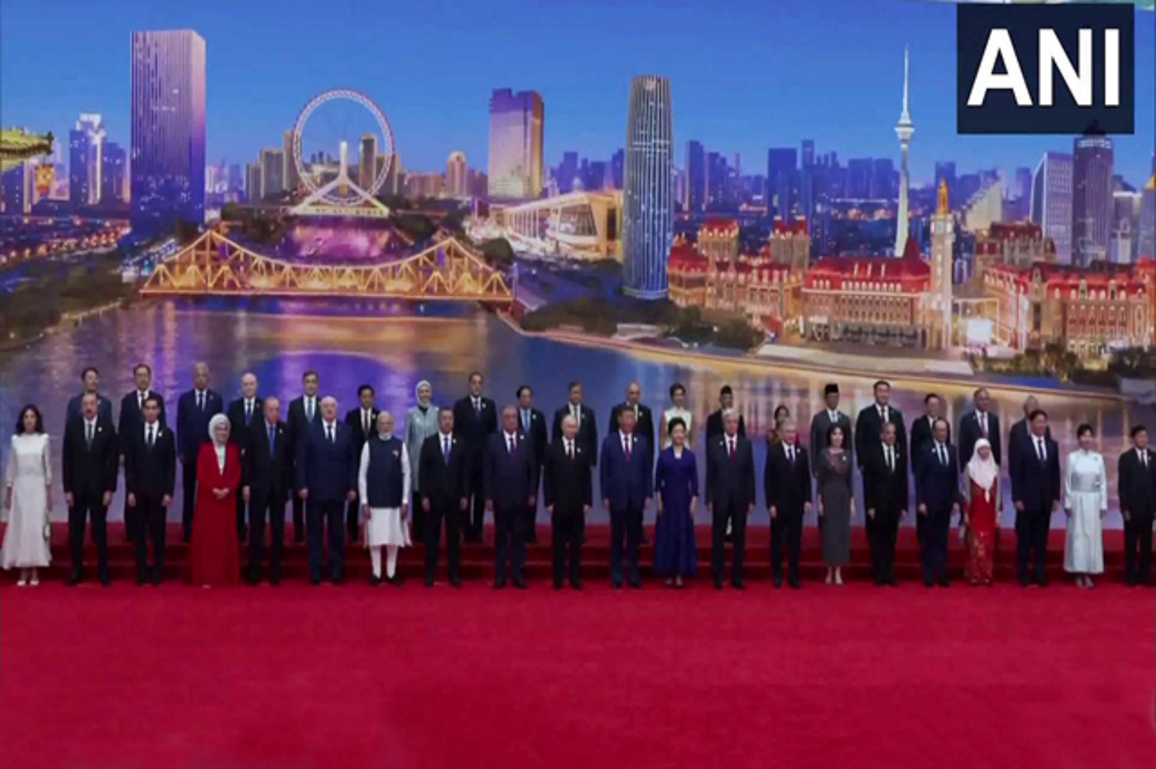 PM Modi attends SCO summit reception in Chinese port city Tianjin, poses for group photo with other world leaders