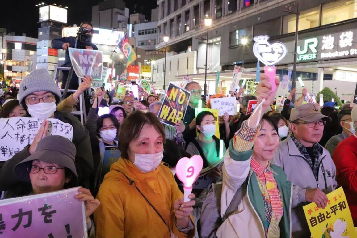 Japan officially eases arms export rules to allow weapons sales despite protests