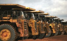 Trucks lined up at Boddington in Australia, which is slated to become the first gold mine in the world with a fully autonomous haulage fleet once it becomes operational in 2021