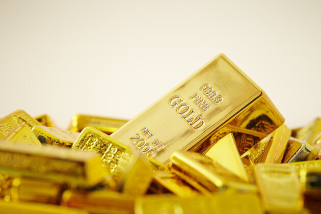 Gold hits near two-week low