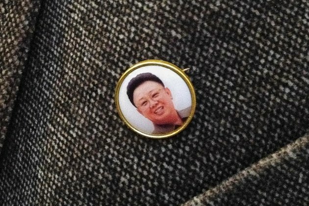 North Korea Issues New Lapel Badge Featuring Kim Jong Il