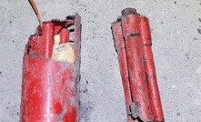  Eroded boosters with exposed cast mixture and only detonator tunnel