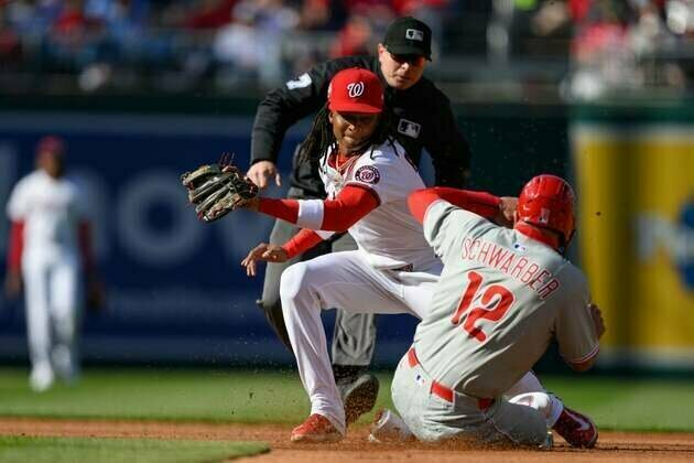 Late heroics lead Phillies past Nationals in extras