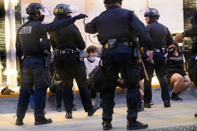 California Police Arrest Curfew Flouters, Chase Thieves
