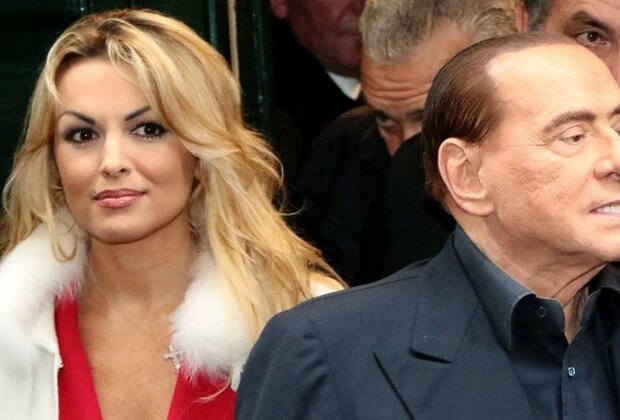 Berlusconi family to evict erotic party women media