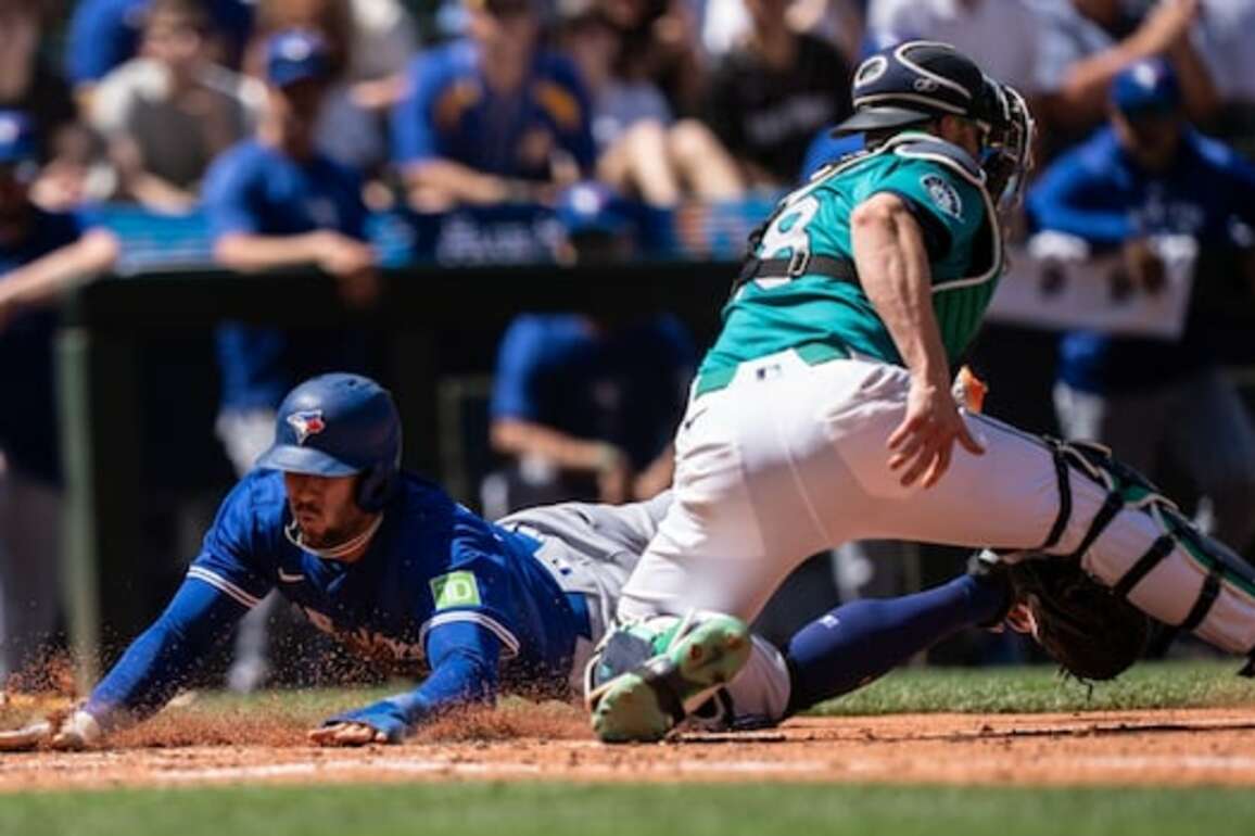 Instead of travelling to Seattle to watch the Blue Jays, some B.C. baseball fans are staying home