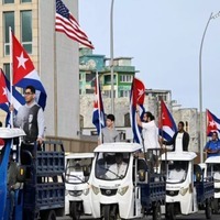 To protest against US sanctions, Cubans ride electric tricycles, bikes