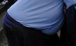 Obese miner wins job back