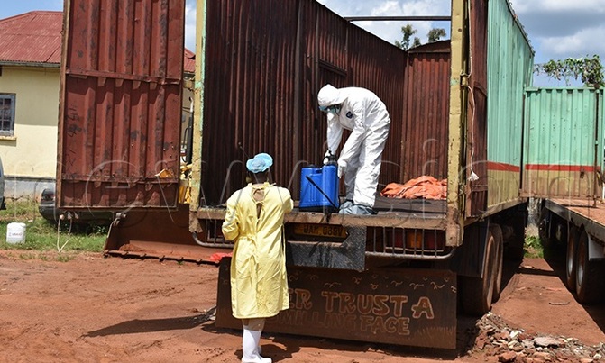Tension in Kamuli as two truck drivers are found with suspicious Corona documents Tension in Kamuli as two truck drivers are found with suspicious Corona documents