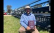  MacDon product specialist Kari Sattler with the Machine of the Year Award for the Henty field days. Picture Mark Saunders.