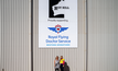  (L-R) RFDS manager Lauren Hubbard and Roy Hill manager Jen Letts with the signage on RFDS’ Port Hedland hangar