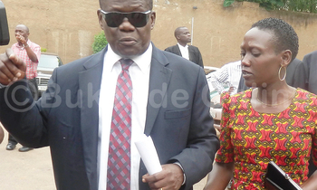 Minisita Byandala bwe yabadde ava mu kkooti okusomerwa emisango. Minisita Byandala bwe yabadde ava mu kkooti okusomerwa emisango.